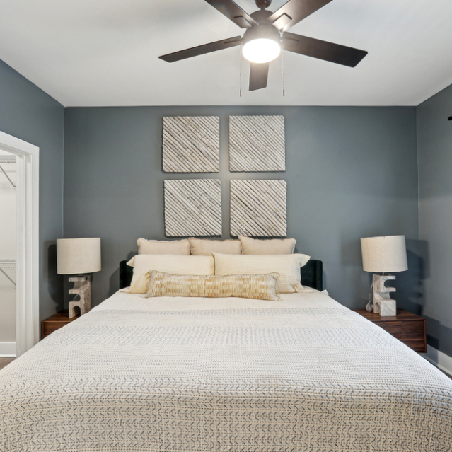 Porter Westside - Apartments in Atlanta, GA - Bedroom showcasing a ceiling fan and a comfortable bed